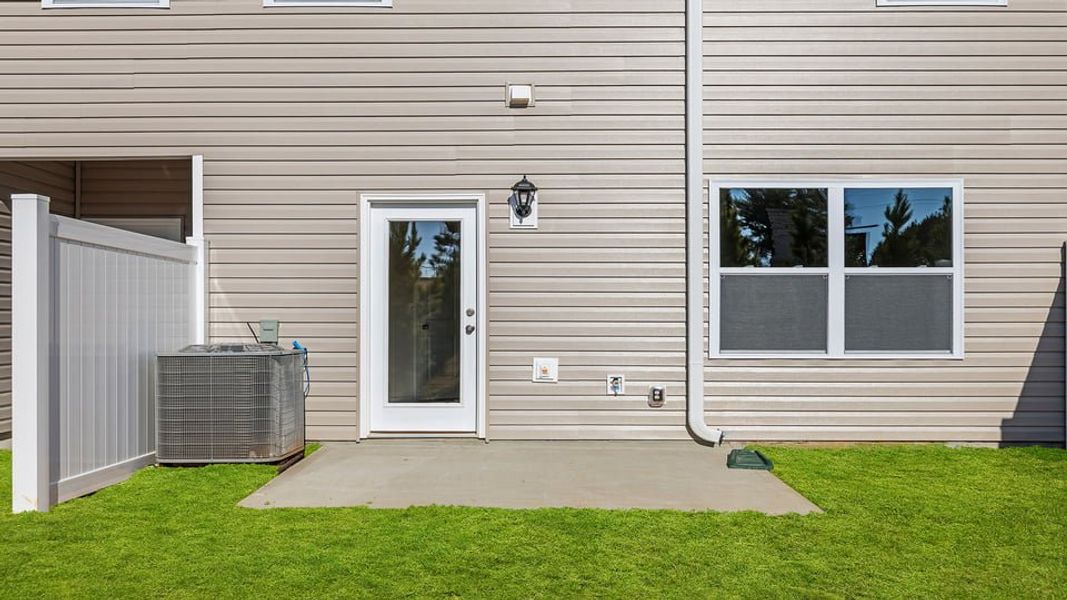 Exterior details and patio area of a home in Brookside Ridge Townhomes, Greer (Image 3). Exterior details and patio area of a home in Brookside Ridge Townhomes, Greer (Image 3).