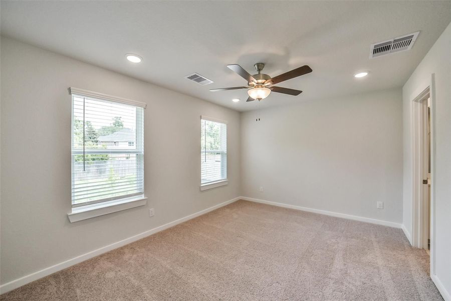 Spacious, unfurnished interior of a new home in Lakes at Black Oak, Magnolia (Image 24).