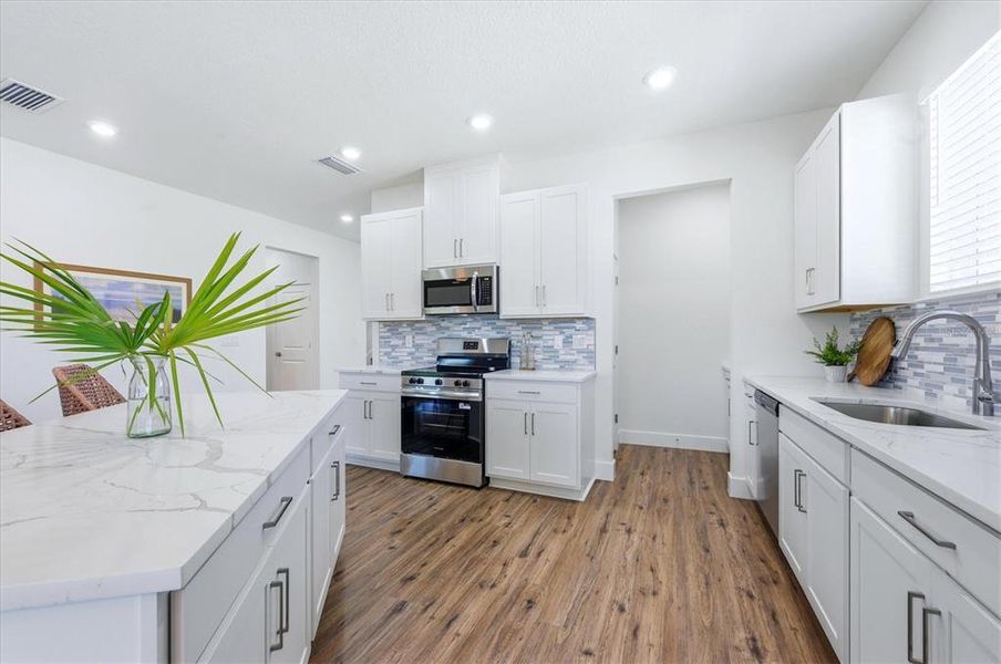 Furnished interior view inside a new home in , Port Charlotte (Image 7).