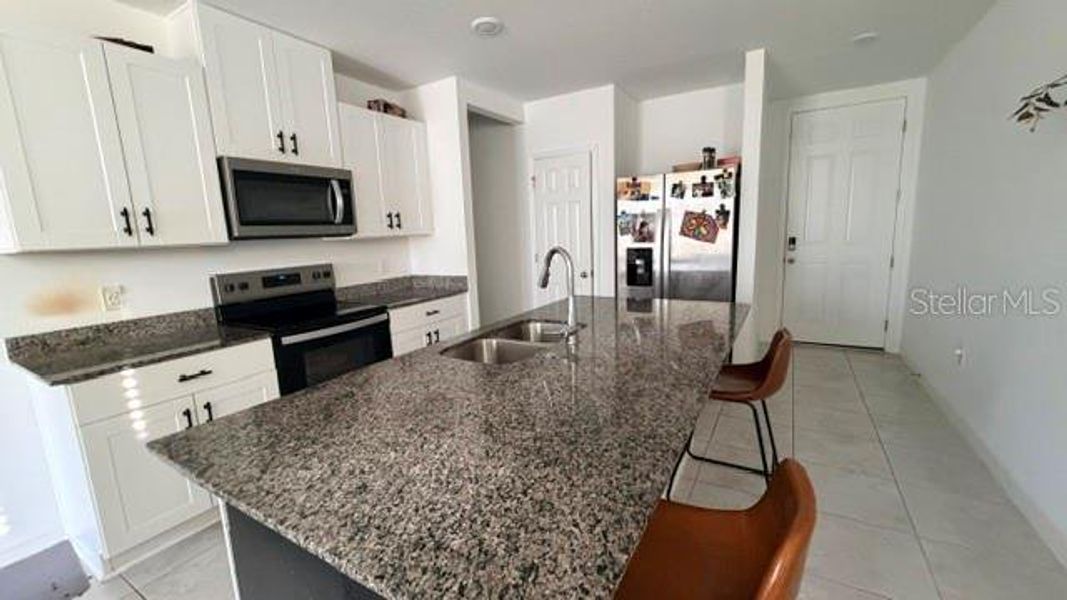 Furnished interior view inside a new home in Villamar - Classic Series, Winter Haven (Image 6).