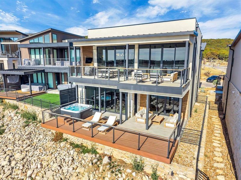 Exterior details and patio area of a home in , Graford (Image 21).