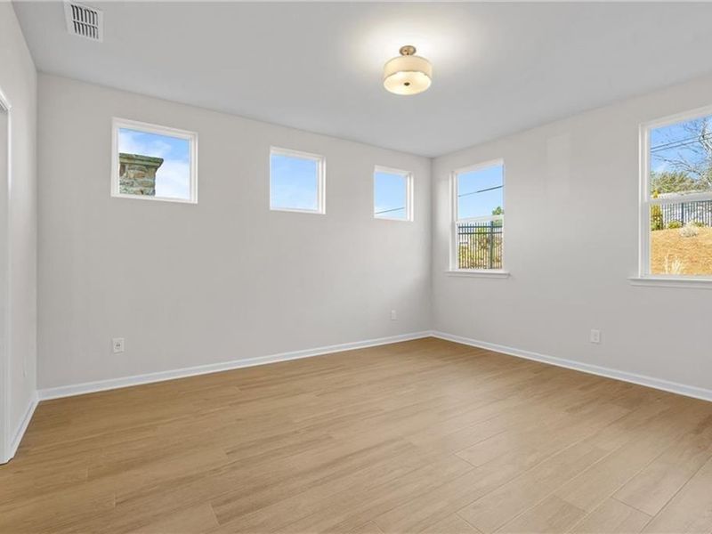 Spacious, unfurnished interior of a new home in Kelly Preserve, Loganville (Image 18). Spacious, unfurnished interior of a new home in Kelly Preserve, Loganville (Image 18).