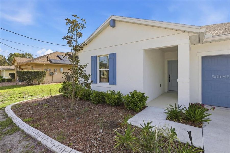 Exterior details and patio area of a home in Aspire at Palm Coast, Palm Coast (Image 3).