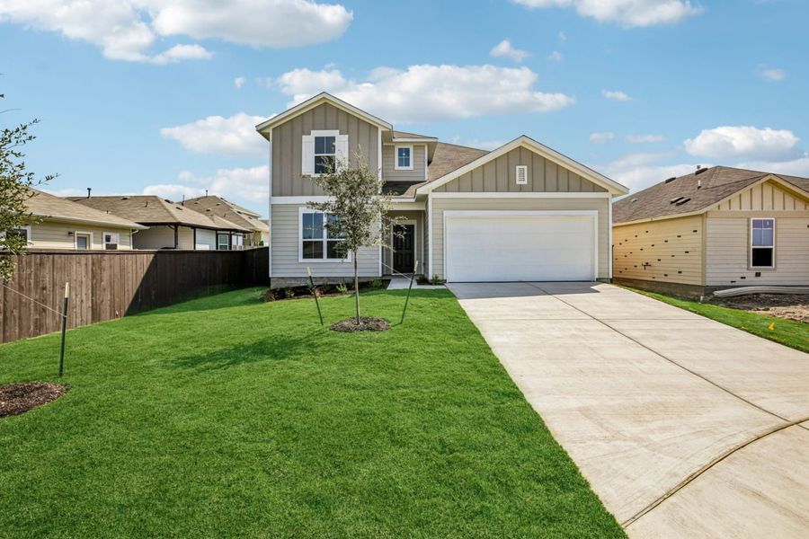 Front exterior of a new home in Cloverleaf, Austin, TX, highlighting curb appeal (Image 18).