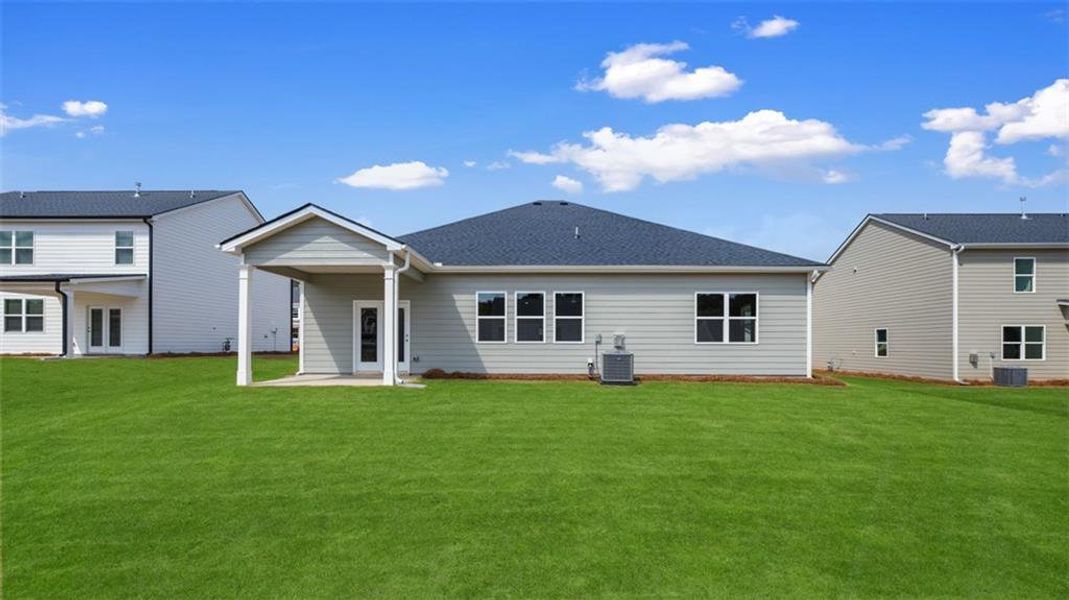 Exterior details and patio area of a home in Preserve at Dove Creek, Statham (Image 3). Exterior details and patio area of a home in Preserve at Dove Creek, Statham (Image 3).