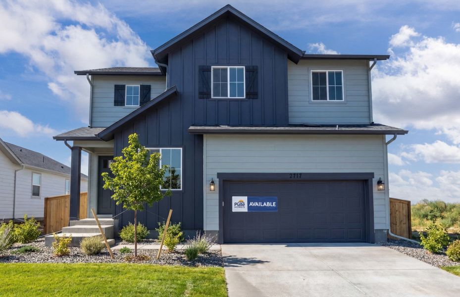Front exterior of a new home in Wolf Creek Run West, Strasburg, CO, highlighting curb appeal (Image 1). Front exterior of a new home in Wolf Creek Run West, Strasburg, CO, highlighting curb appeal (Image 1).