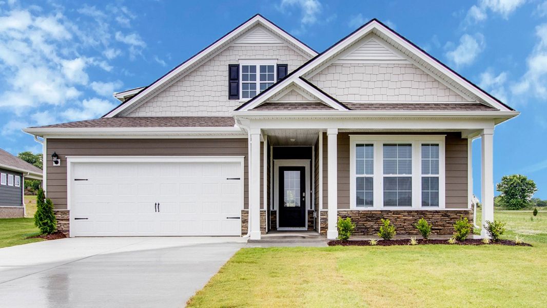 Front exterior of a new home in Legacy Farms, White House, TN, highlighting curb appeal (Image 1). Front exterior of a new home in Legacy Farms, White House, TN, highlighting curb appeal (Image 1).