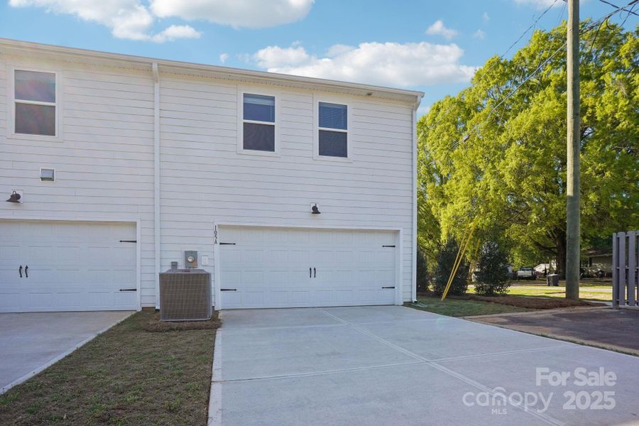 Front exterior of a new home in Crossrail Station, Mooresville, NC, highlighting curb appeal (Image 1).