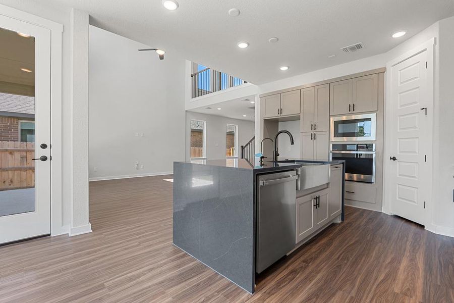 Furnished interior view inside a new home in Terrace Collection at Lariat, Liberty Hill (Image 11). Furnished interior view inside a new home in Terrace Collection at Lariat, Liberty Hill (Image 11).