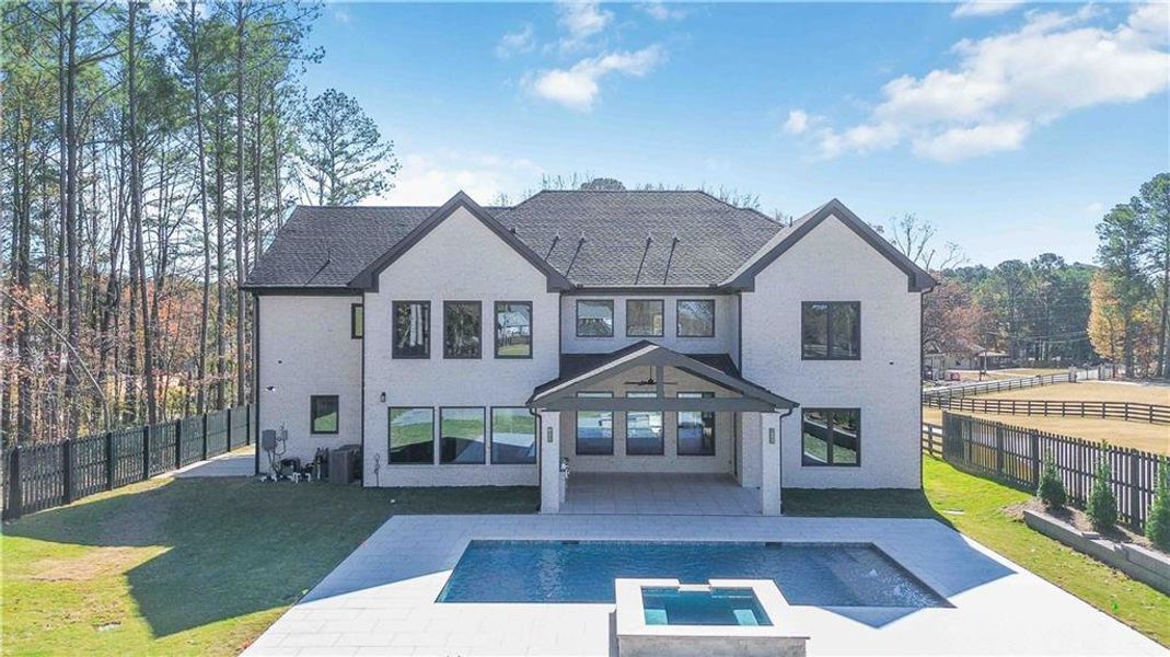 Front exterior of a new home in , Lawrenceville, GA, highlighting curb appeal (Image 2).