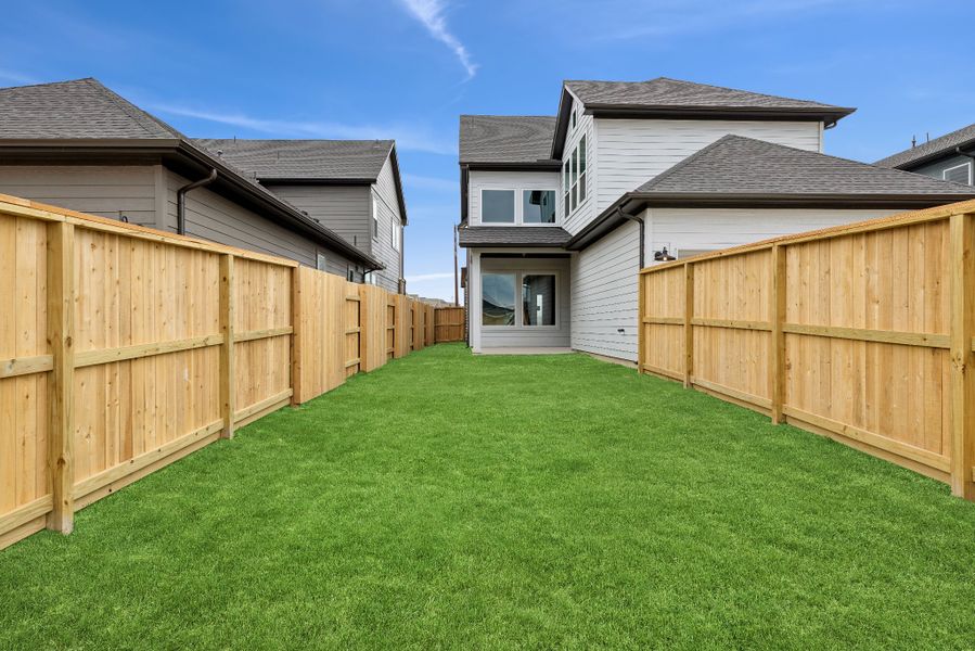 Exterior details and patio area of a home in Elyson 40', Katy (Image 3).