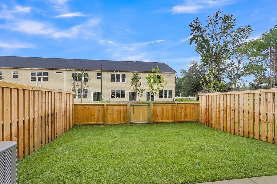 Exterior details and patio area of a home in Pineland Preserve, Summerville (Image 22).