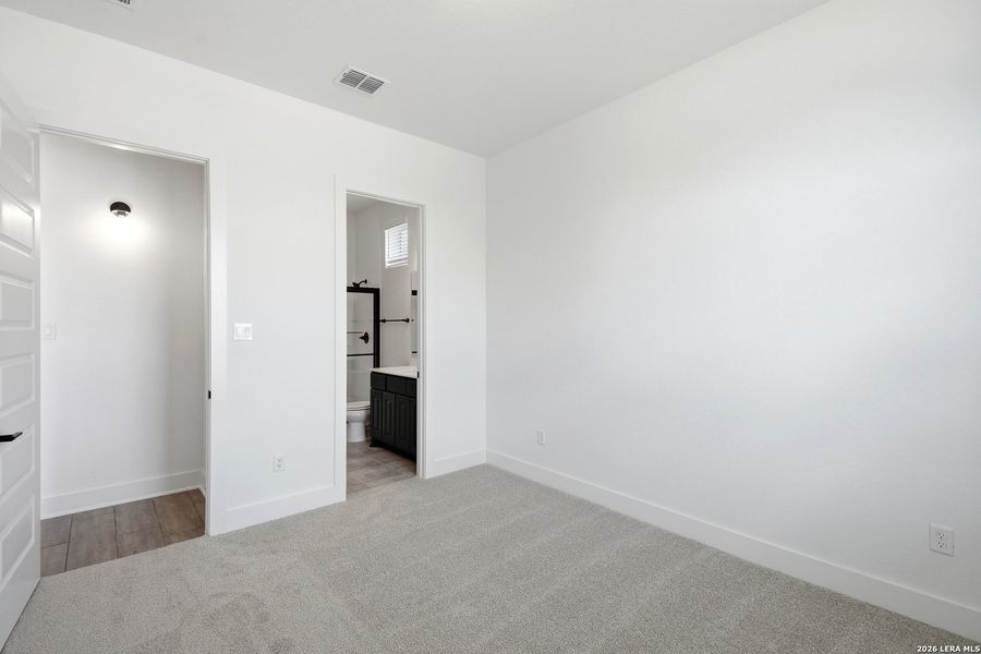Spacious, unfurnished interior of a new home in The Reserve at Potranco Oaks, Castroville (Image 38).