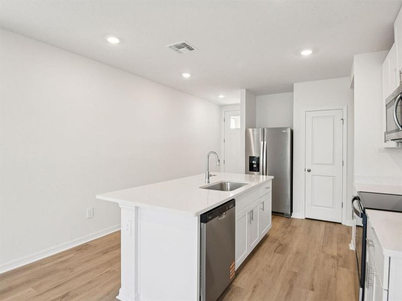 Furnished interior view inside a new home in Salt Meadows - Premier Series, Parrish (Image 5).