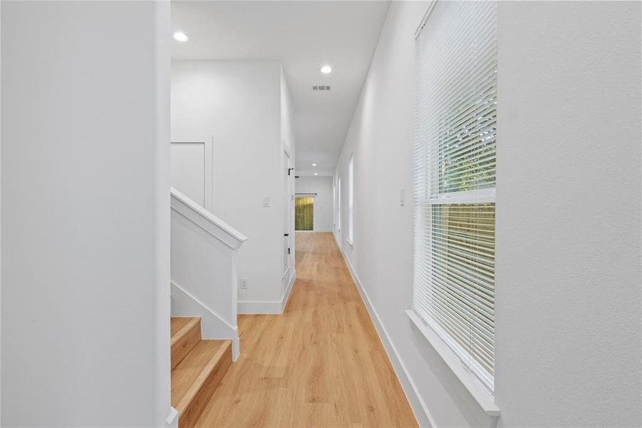 Hall with light wood-type flooring