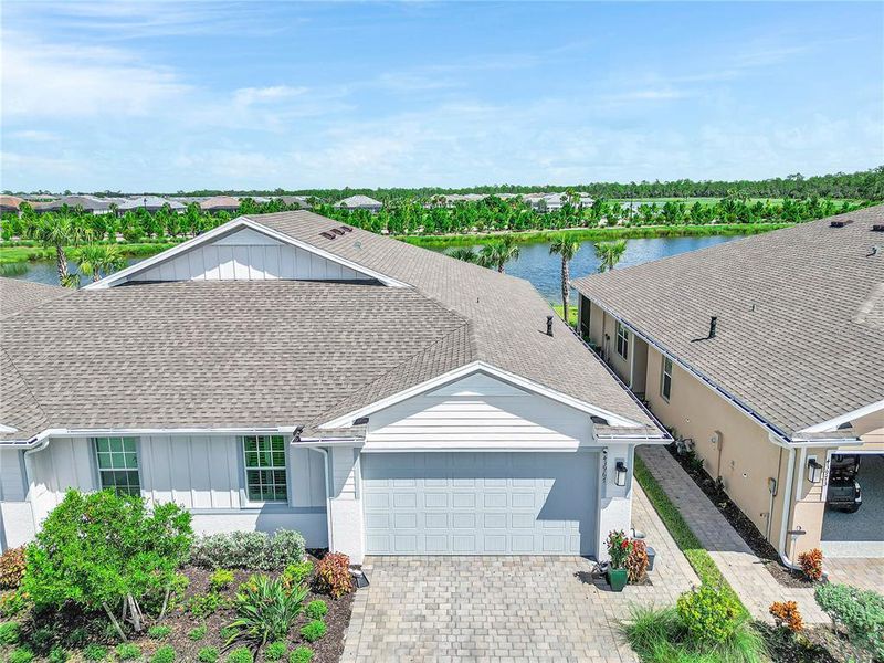 Front exterior of a new home in , Punta Gorda, FL, highlighting curb appeal (Image 28).