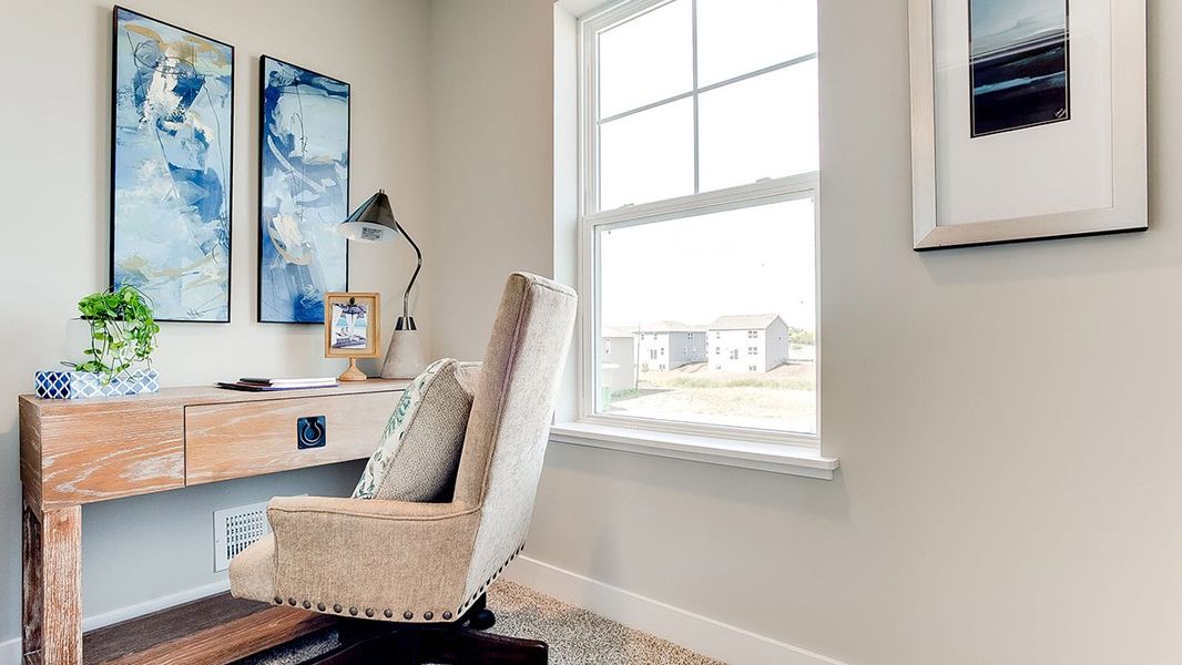 Representative furnished interior of a home built from the The Sienna by D.R. Horton in Thornton Townes, Raleigh (Image 15).