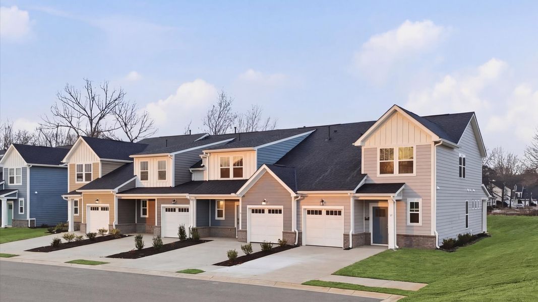 Refined exterior design with balanced architectural detail in this distinguished two-story villa by DRB Homes