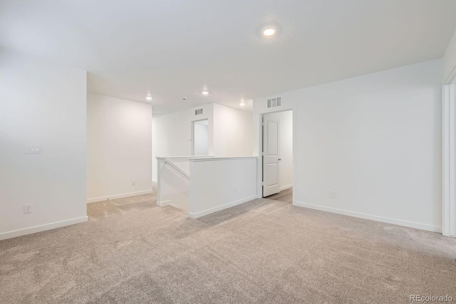 Spacious, unfurnished interior of a new home in Copper Chase: The Celestial Collection, Colorado Springs (Image 11).