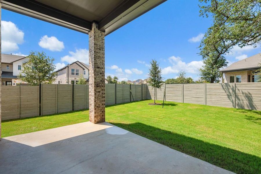 Exterior details and patio area of a home in Wolf Ranch, Georgetown (Image 4).
