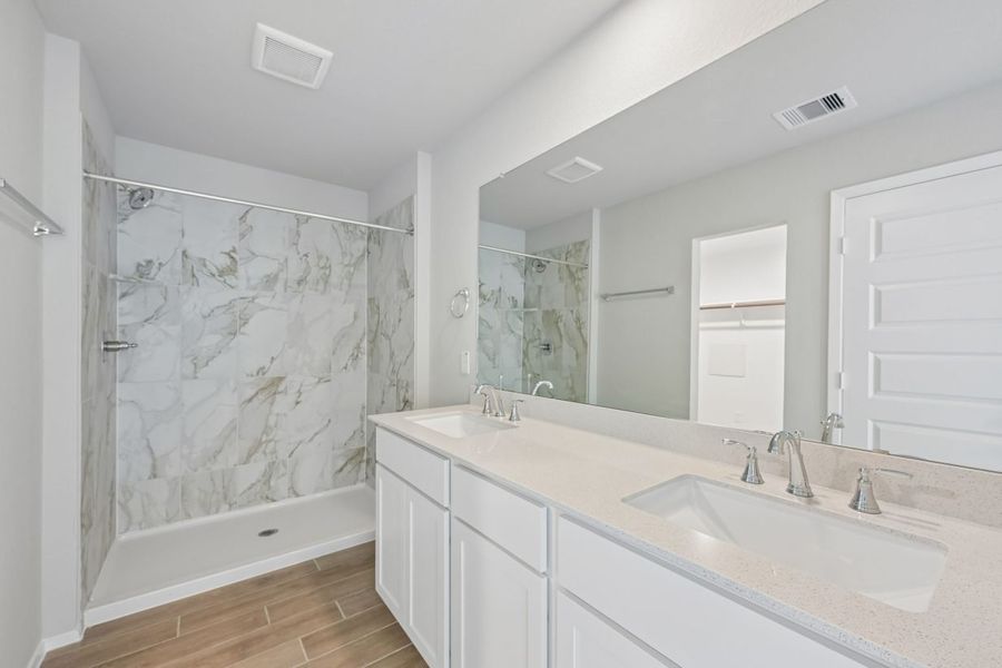 Furnished interior view inside a new home in Azalea, Pattison (Image 14).