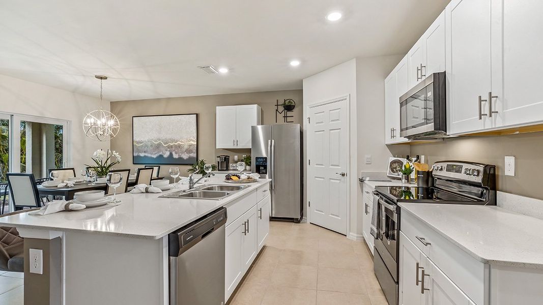 Representative furnished interior of a home built from the Cali by D.R. Horton in North Port - Express Series, North Port (Image 6).
