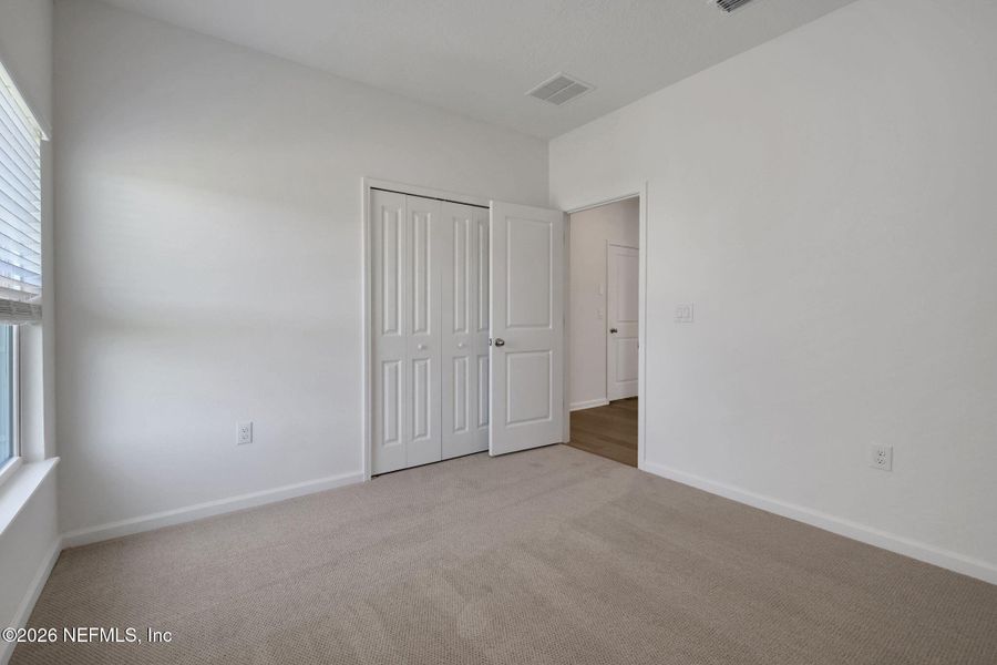 Spacious, unfurnished interior of a new home in Brook Forest, St. Augustine (Image 44).