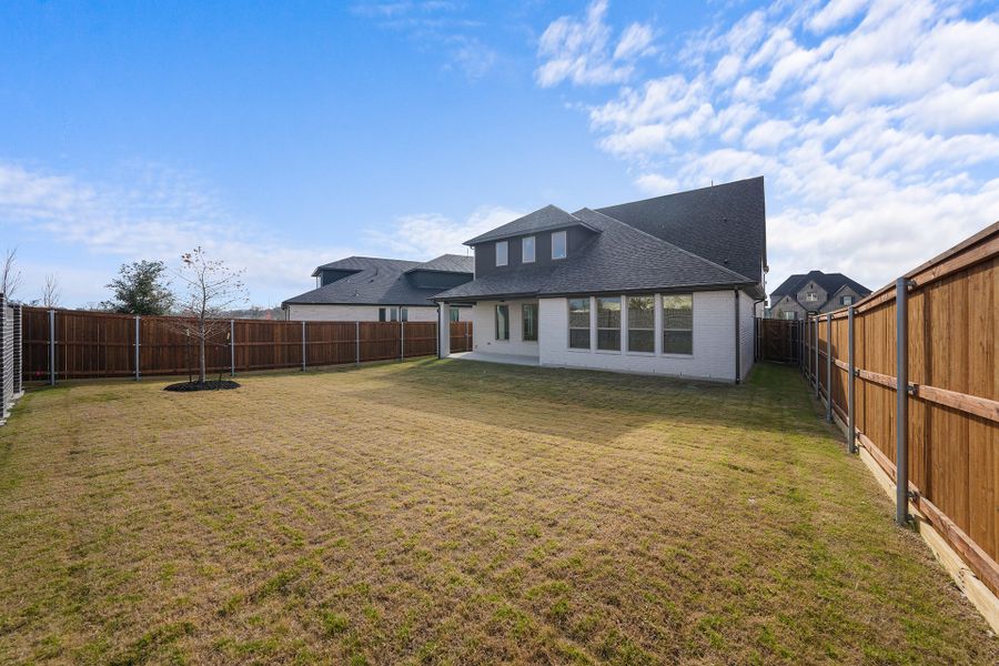 Exterior details and patio area of a home in Aster Park, McKinney (Image 4).