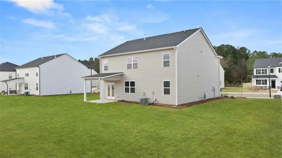 Exterior details and patio area of a home in Preserve at Dove Creek, Statham (Image 2). Exterior details and patio area of a home in Preserve at Dove Creek, Statham (Image 2).