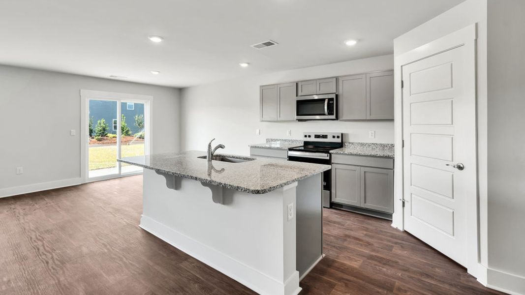 Furnished interior view inside a new home in Sidbury Station, Castle Hayne (Image 5).