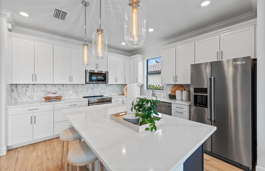 Elegant kitchen with designer finishes Elegant kitchen with designer finishes