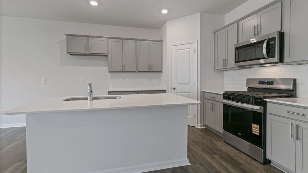 Furnished interior view inside a new home in Chapel Townes, Raleigh (Image 7). Furnished interior view inside a new home in Chapel Townes, Raleigh (Image 7).