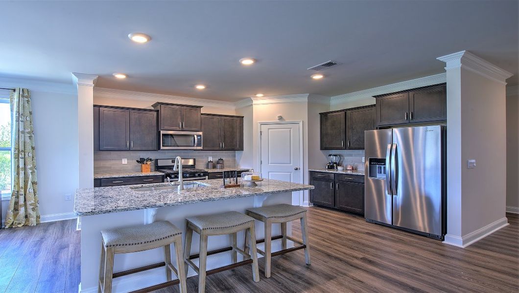 Furnished interior view inside a new home in Reserve at Tap Root Farms, Fletcher (Image 7). Furnished interior view inside a new home in Reserve at Tap Root Farms, Fletcher (Image 7).