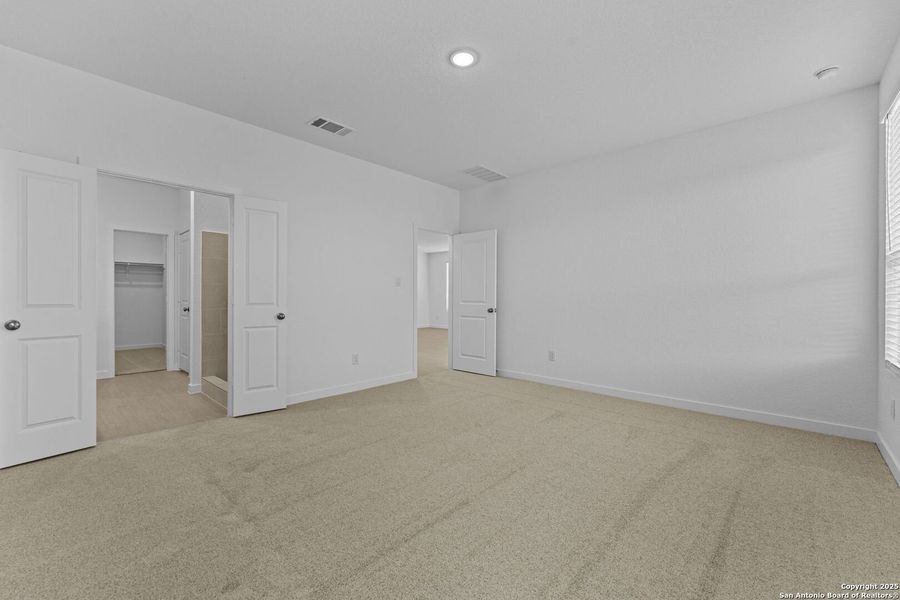 Spacious, unfurnished interior of a new home in Waterwheel: Coastline Collection, San Antonio (Image 28).