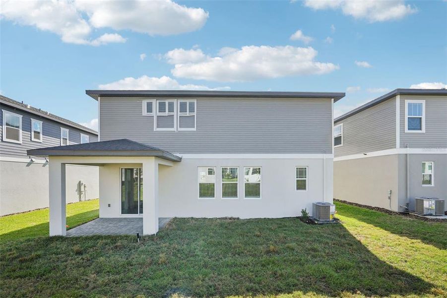 Exterior details and patio area of a home in Cyrene at Minneola, Minneola (Image 3). Exterior details and patio area of a home in Cyrene at Minneola, Minneola (Image 3).