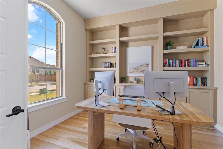 Office with double doors and custom built-in