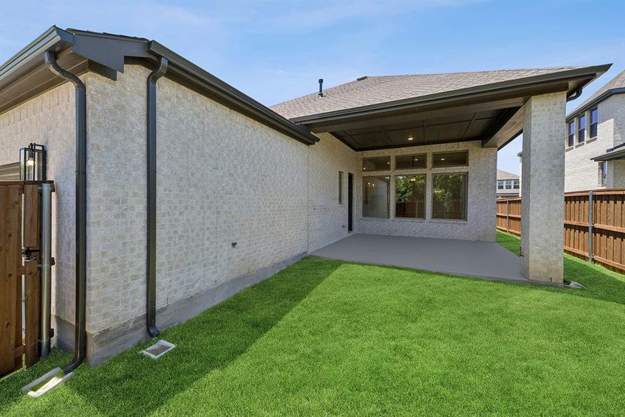 Front exterior of a new home in Karis - Village Series, Crowley, TX, highlighting curb appeal (Image 2). Front exterior of a new home in Karis - Village Series, Crowley, TX, highlighting curb appeal (Image 2).