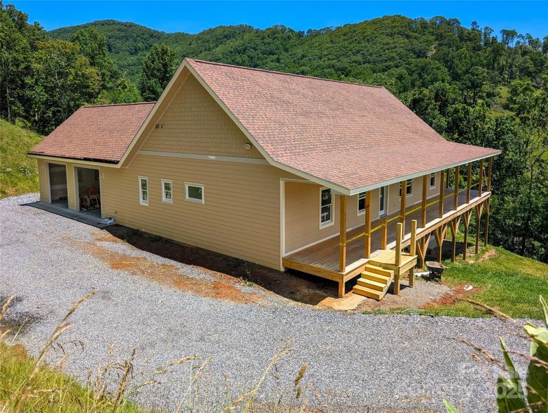 Front exterior of a new home in , Burnsville, NC, highlighting curb appeal (Image 9). Front exterior of a new home in , Burnsville, NC, highlighting curb appeal (Image 9).