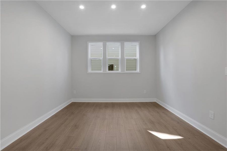 Spacious, unfurnished interior of a new home in The Paddocks at Doc Hughes, Buford (Image 52).