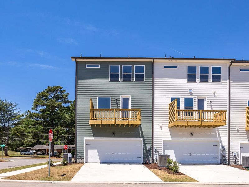 Front exterior of a new home in Camden Park, Knightdale, NC, highlighting curb appeal (Image 2). Front exterior of a new home in Camden Park, Knightdale, NC, highlighting curb appeal (Image 2).