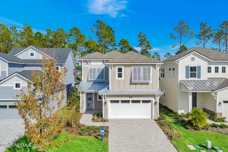 Front exterior of a new home in Crosswinds at Nocatee, Ponte Vedra, FL, highlighting curb appeal (Image 27).