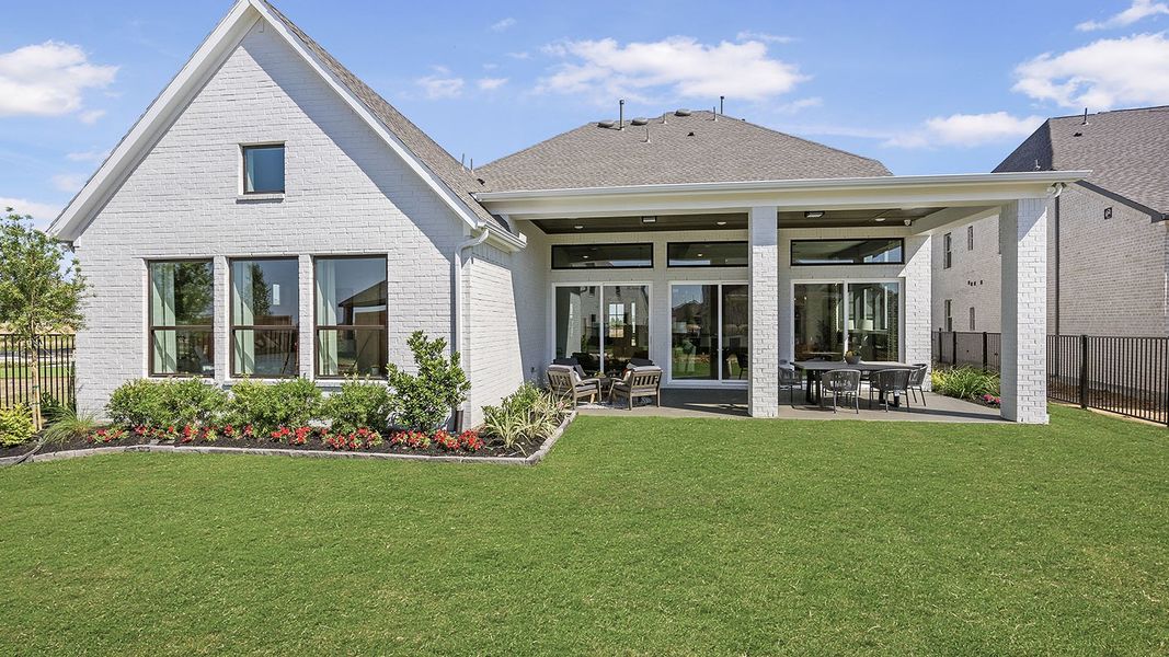 Exterior details and patio area of a home in Prairieland Village 60' Homesites, Cypress (Image 3). Exterior details and patio area of a home in Prairieland Village 60' Homesites, Cypress (Image 3).