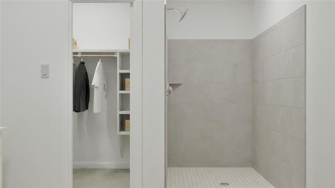 Bathroom with a stall shower and a closet Bathroom with a stall shower and a closet