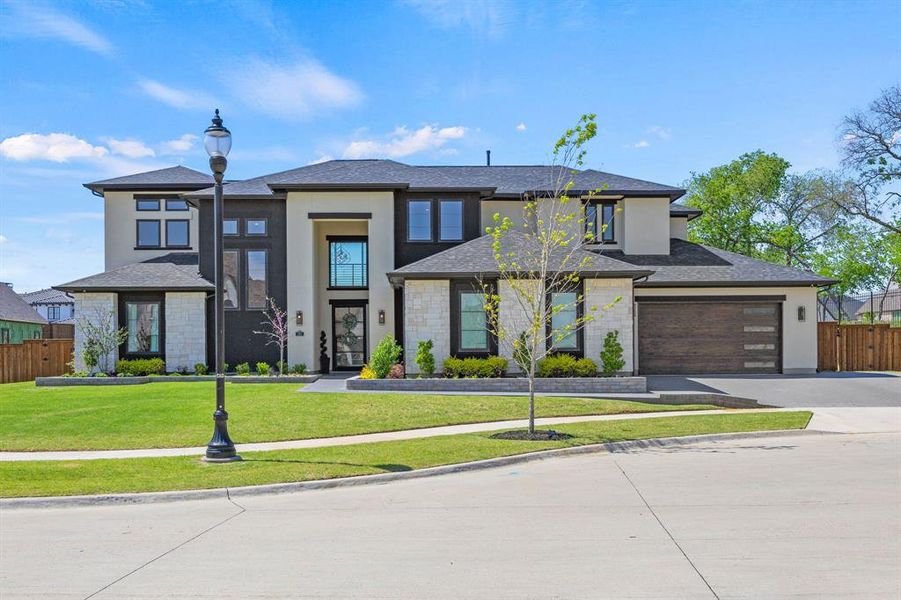 Front exterior of a new home in , Prosper, TX, highlighting curb appeal (Image 1). Front exterior of a new home in , Prosper, TX, highlighting curb appeal (Image 1).