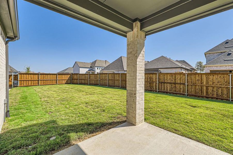 View of yard with a patio area