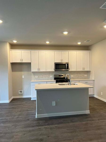 Furnished interior view inside a new home in Lakehaven - Spring Series, Farmersville (Image 5).