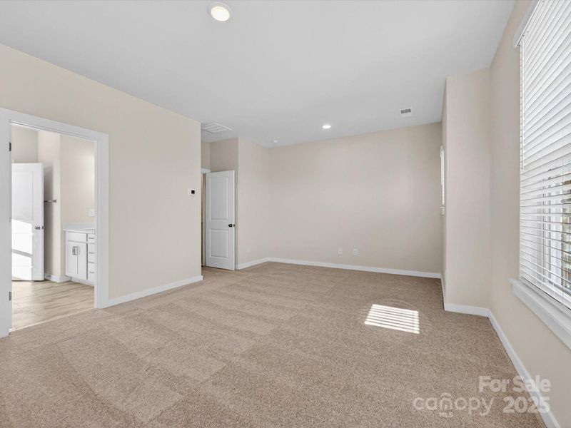 Spacious, unfurnished interior of a new home in Central Living at Craig, Charlotte (Image 17).