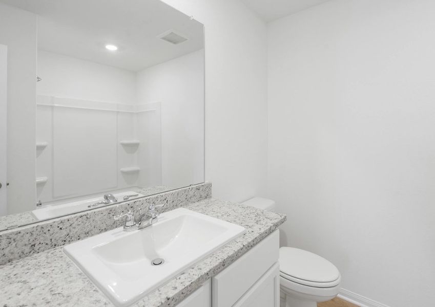 Secondary bathroom with a shower/tub combination