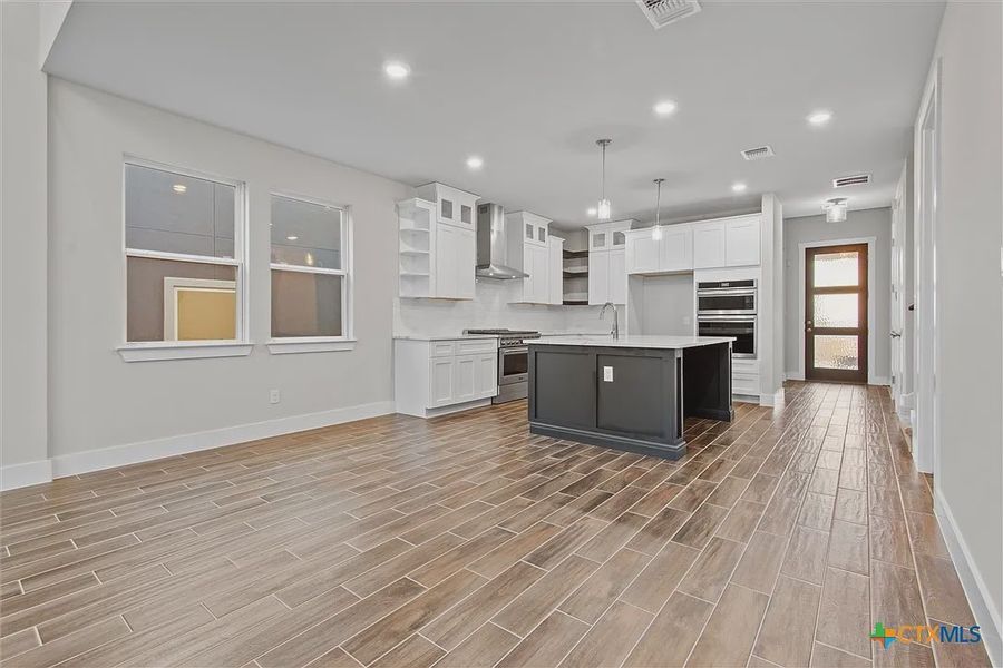 Spacious, unfurnished interior of a new home in Lakeside at Tessera on Lake Travis, Lago Vista (Image 12). Spacious, unfurnished interior of a new home in Lakeside at Tessera on Lake Travis, Lago Vista (Image 12).
