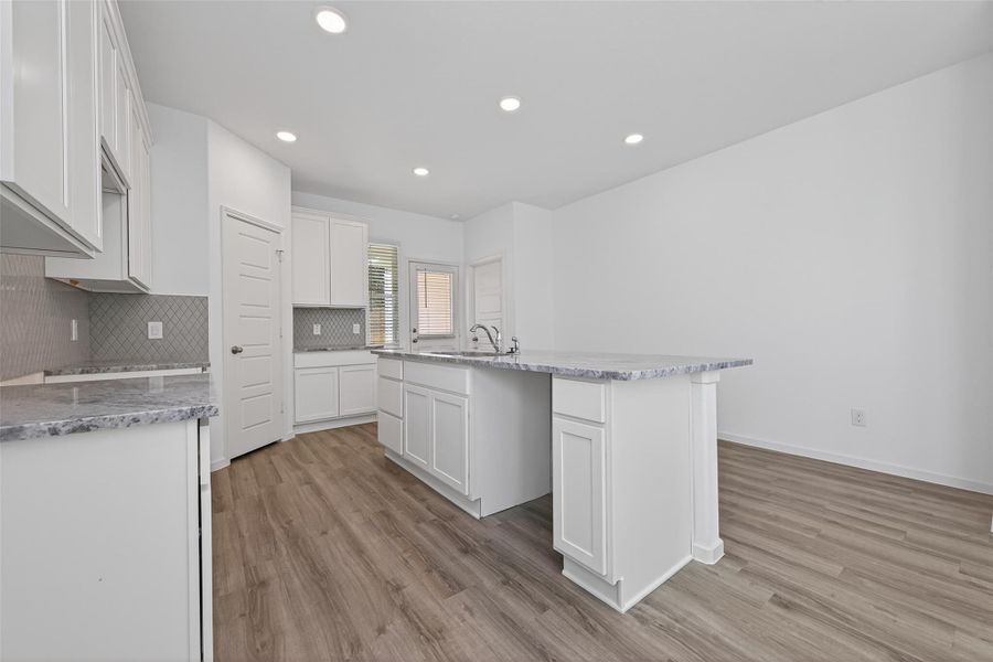 Furnished interior view inside a new home in Enclave at Willis, Willis (Image 8).